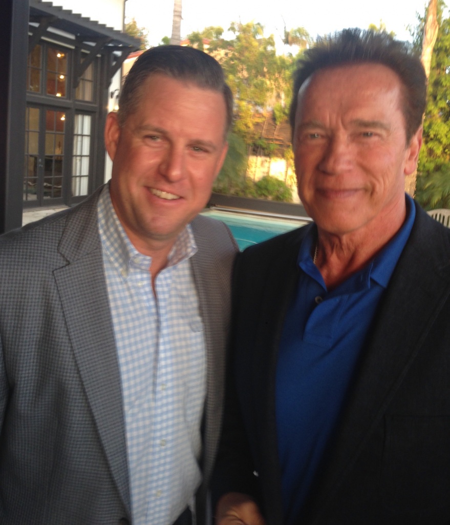 Colby-Arrow-with-Arnold-Schwarzenegger-e1502388068271-879x1024.jpg